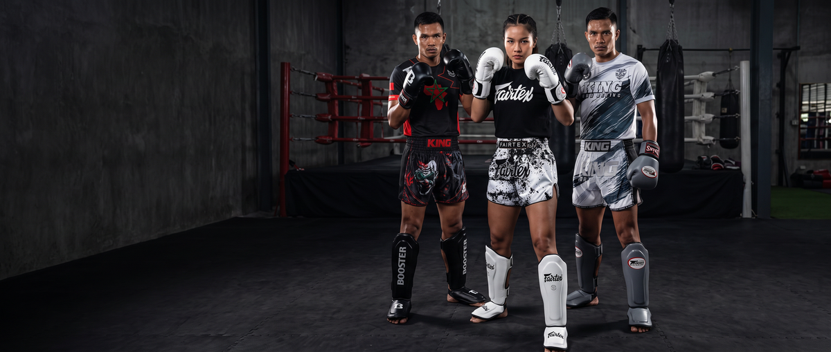 Best Fighters - three fighters in boxing gym
